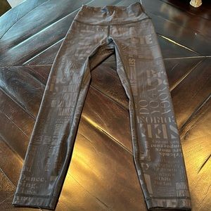 Lululemon tights with lulu print -Black.  2 or 4